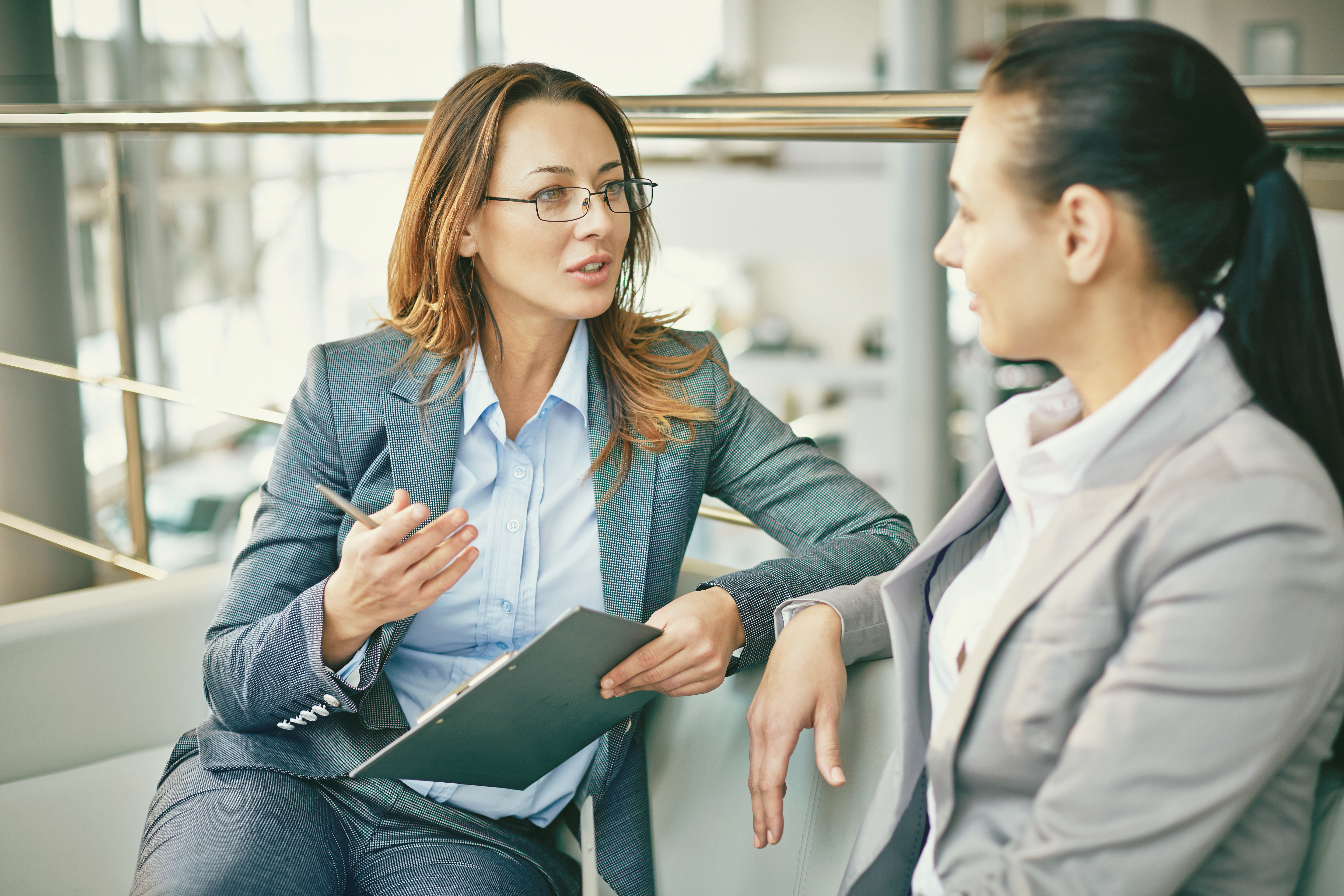 HR Going Over Employee Benefits Package for their Small Business