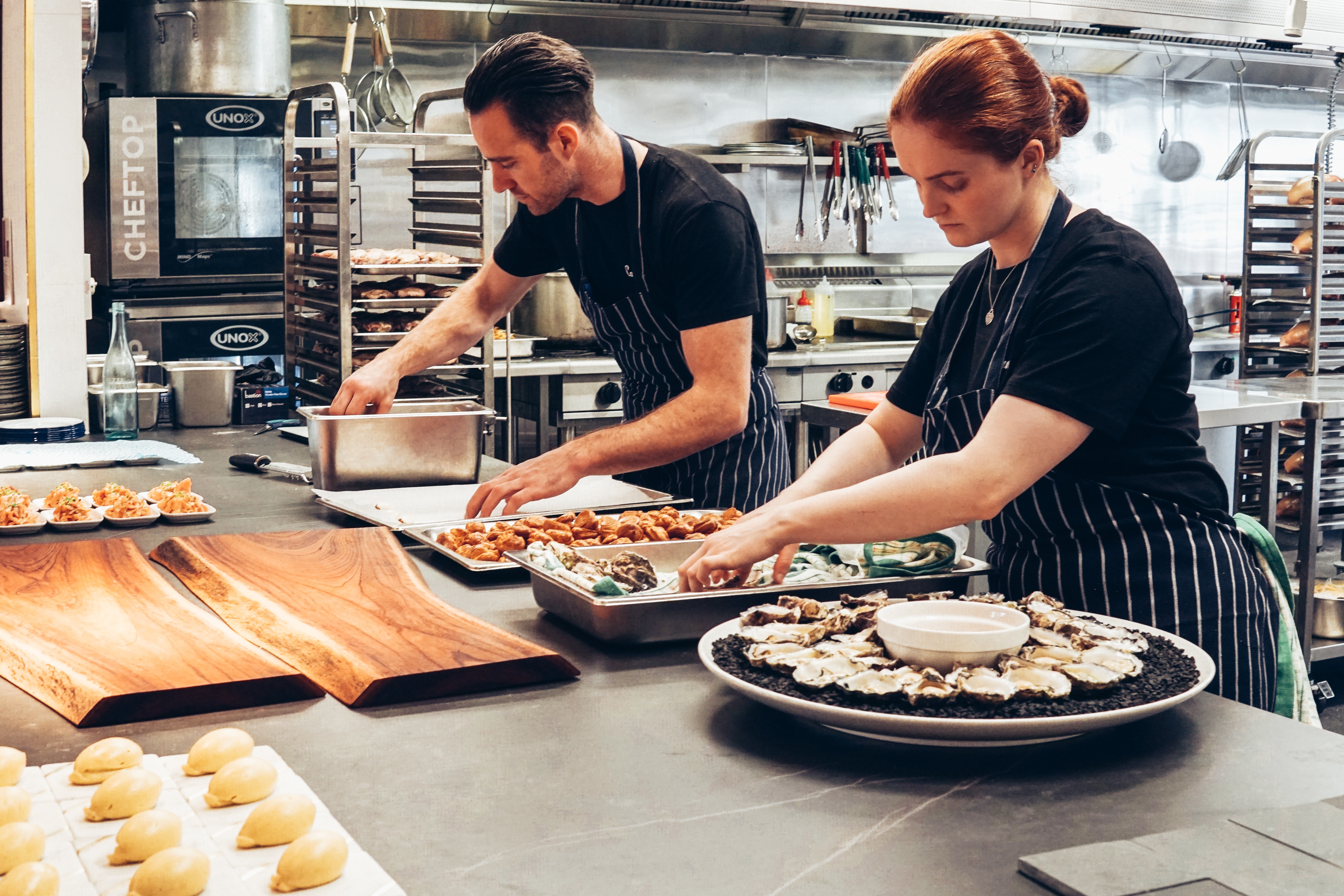 Business Owners Working in Kitchen
