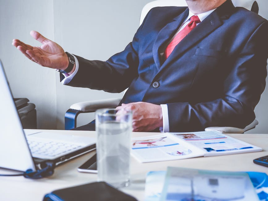 Business Owner Discussing Cash Management Problems and Solutions