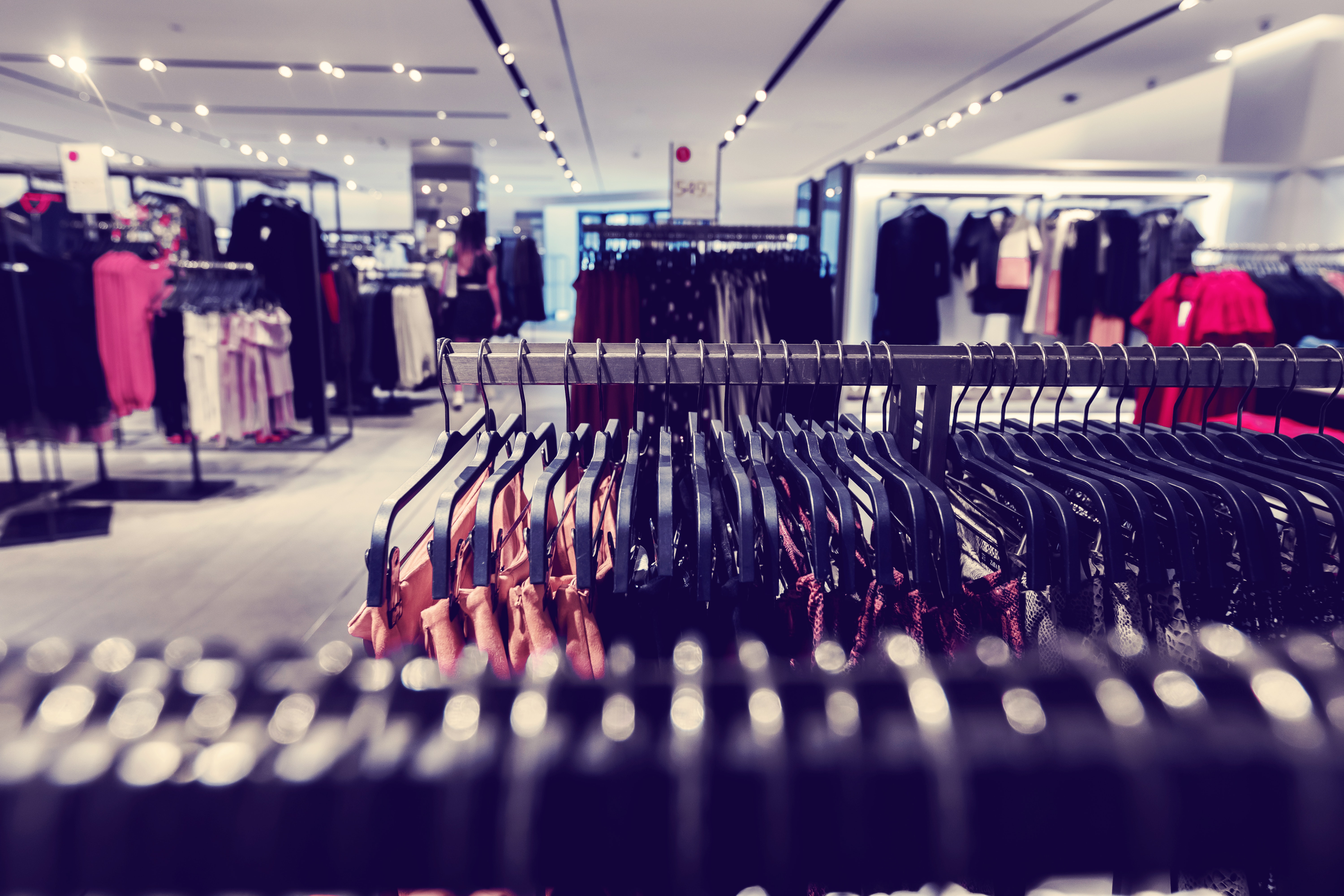 Clothes Hanging in a Retail Shop that just obtained an Unsecured Business Line of Credit