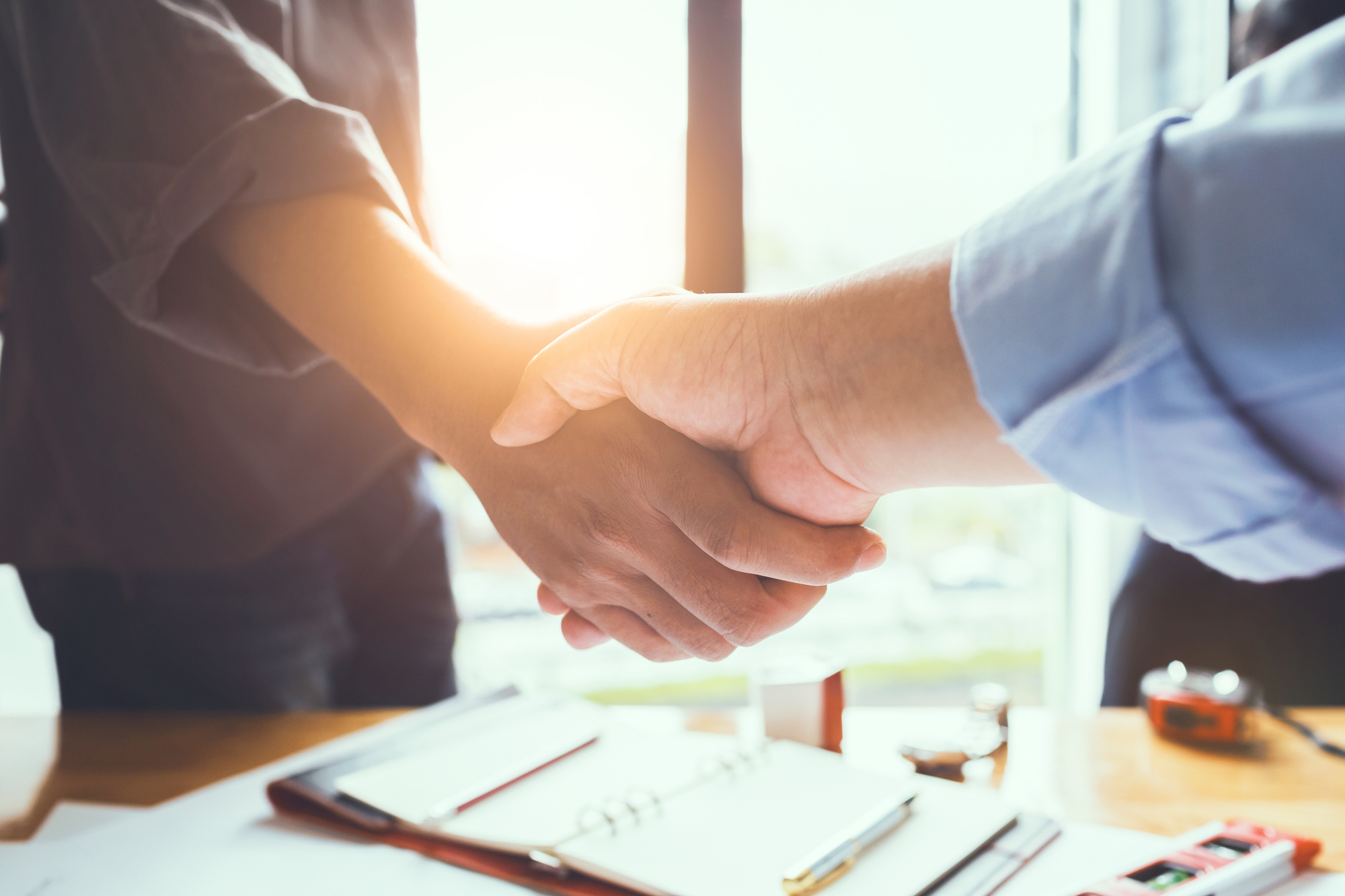 Two Business Owners Shaking Hands