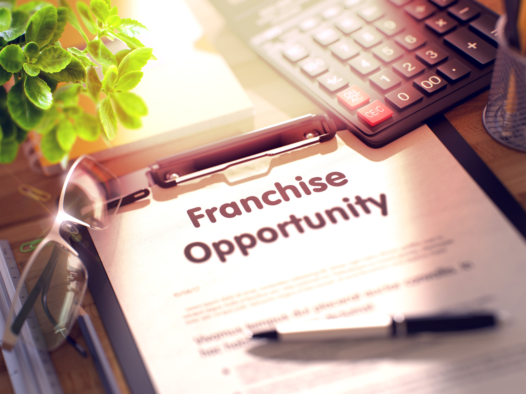 Franchise Opportunity Document on Clipboard